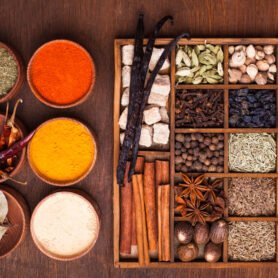 Different types of spices in wooden box